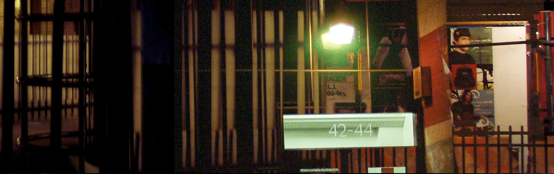 [scene 2 flickering]<br />
			through a zoetrope of slender bars <br />
			the interior <span class="enlarge">animates</span> <br />
			frames of a film unfurling on the street.